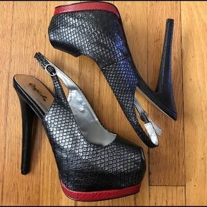 NWOT snakeskin heels.